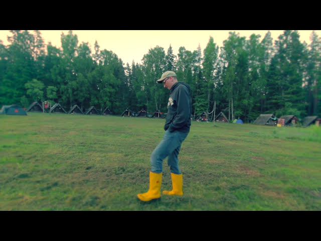 An Estonian Man With Yellow Rubber Boots on a Midsummer night Festival at Sunrise + Short Interview