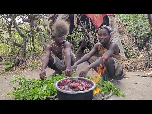 Hadza hunt and cooking meat Lunch.