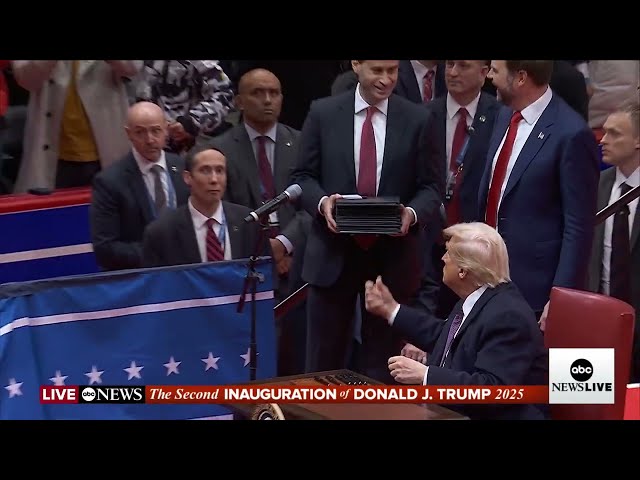 Pres. Trump tosses pens he used to sign executive orders into crowd at inaugural parade