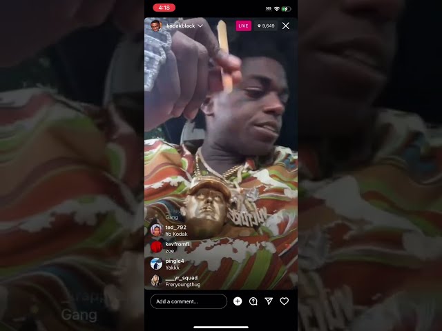 #kodakblack on instagram live showing off his jewelry in a Wendy's drive thru