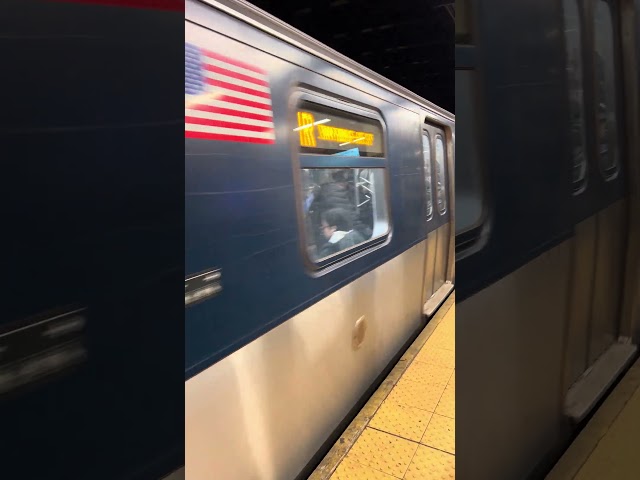 R160 R train via Broadway Express leaving Times Square-42nd Street