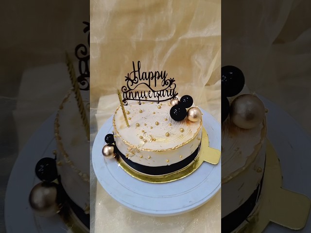 Beautiful golden & black  thermed Anniversary cake design #thegoodcheffhappy #cakedecoration