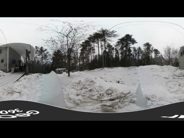 360 view of snow falling in Maine