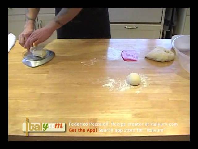 Cutting your Pizza dough into smaller balls.