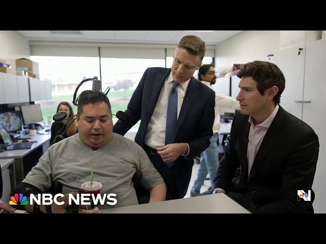 Brain implant helps man with paralysis regain movement