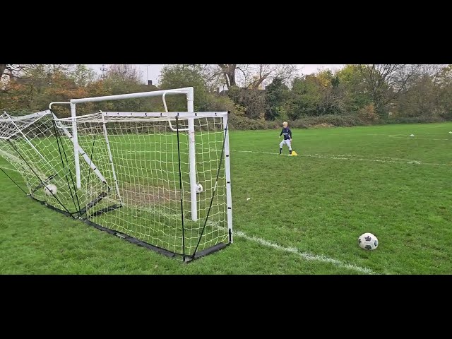 Jaxson knocking over goals in London with Coach Lawrence: turns & finishing