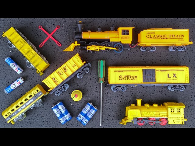 Unboxing dan merakit mainan kereta api kuning,rail king jumbo,engineering train,lokomotif uap