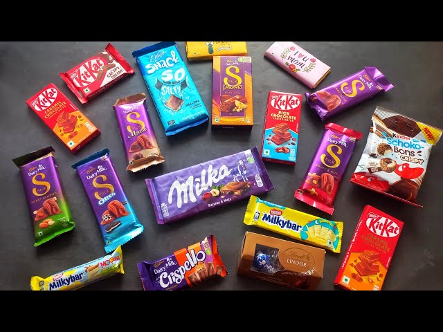 100 candies opening, chocolate a video, lots of chocolates, Cadbury celebration, surprise toys