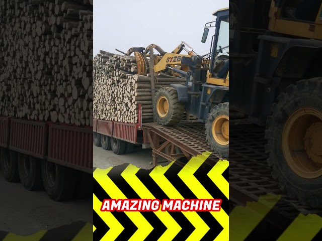 lifting unloading a bundle of long wooden logs from the back of a truck #truck