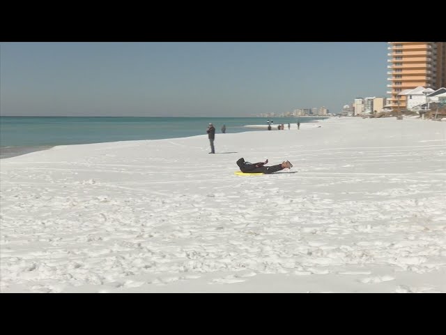 Panama City Beach residents celebrate rare winter wonderland on the beach