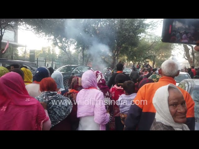 BJP workers light fire crackers atop car, celebrate BJP victory in Delhi Election: fire cracker ban?