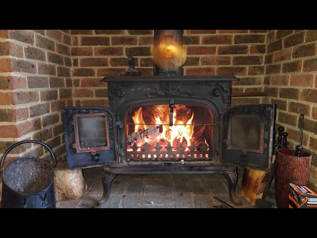 GETTING A FARMHOUSE WOOD BURNER ALL SAFE FOR A CUSTOMER, VERY TARRY AND WET.