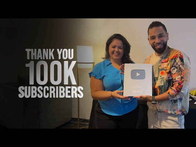 Receiving the 100k subscribers award from Youtube