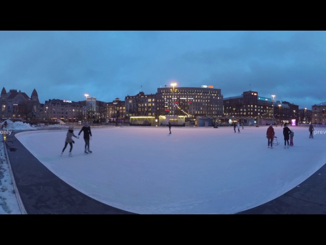 360 VR Railway Station and people on skating rink in evening Helsinki, Finland