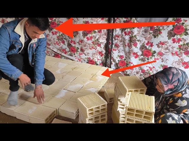 Kind shopkeeper: Placing bricks to prevent rain inside the tent of a nomadic family