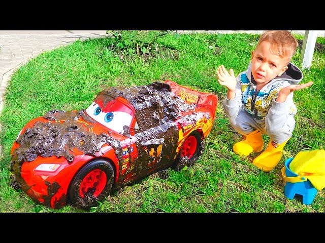 Nikita and Red Toy Car Wash