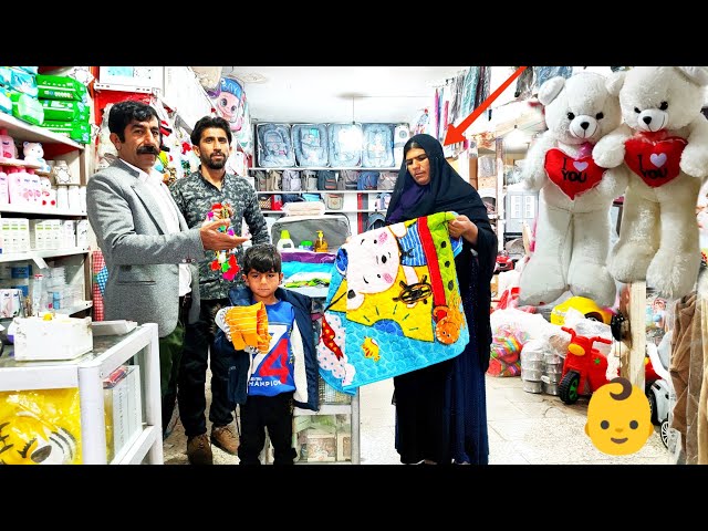 Going to buy different colored clothes for the baby by Akbar and his wife Fatemeh