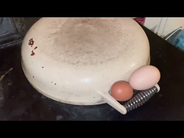 Cooking on the Aga - a double yoke farm fresh fried egg - farmer fast food