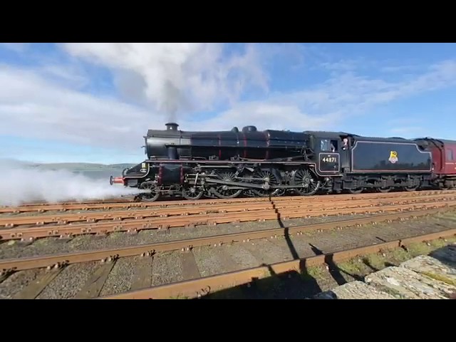 Great Britain X11 steam train departing Stranrear on 19/05/02 at 1727 in VR180 3D 4K