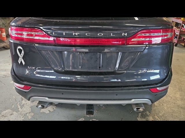 Lincoln Mkc and Ford Edge tailgate won't open. Tailgate module making clicking noise.