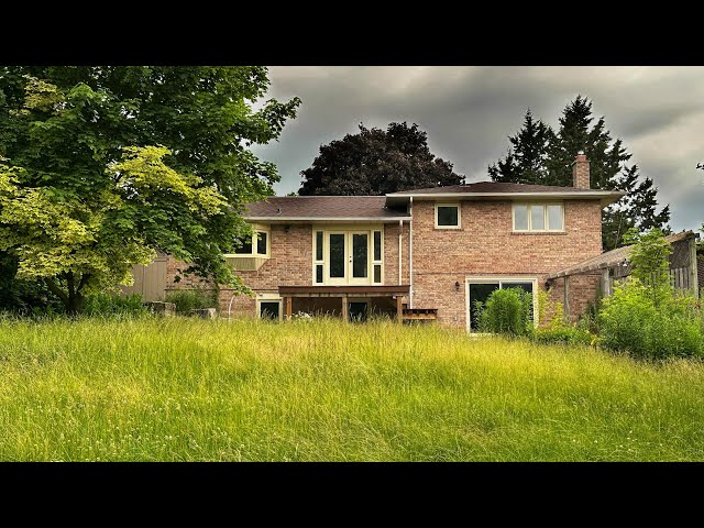 Massive ABANDONED 1970s split level house (stuff left behind!)