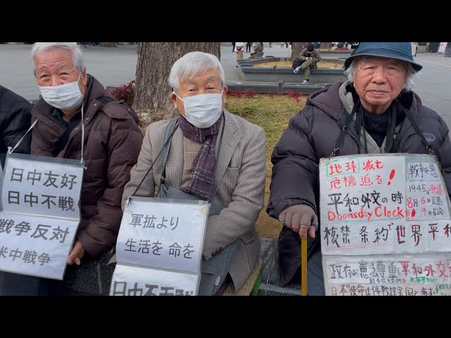 日本長者掛標語，反戰靜坐和理非。