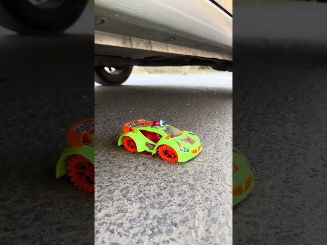 Race Over: Car Tire vs. Toy Car