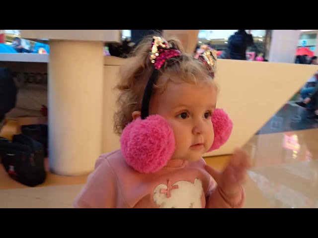 Cute baby dea wearing big earmuffs funniest home videos