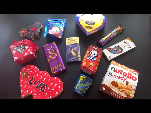 100 candies opening, chocolate a video, lots of chocolates, Cadbury celebration, surprise toys