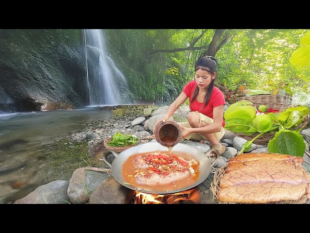 Solo cooking Fish egg spicy chili for dinner in forest