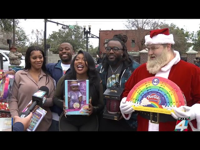 Jacksonville rapper, producer team up to gift kids with bikes and toys just before Christmas