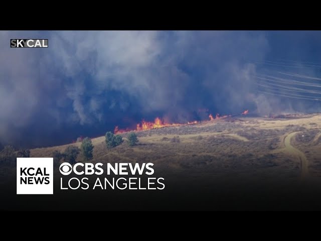 Fire crews battling Hughes Fire with water-dropping aircraft