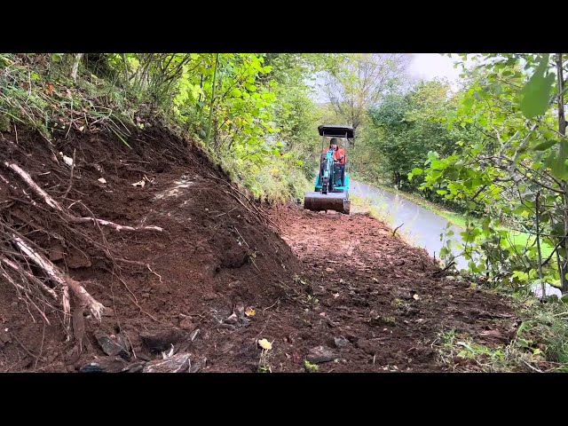 Cutting a trail with the 1-ton mini excavator