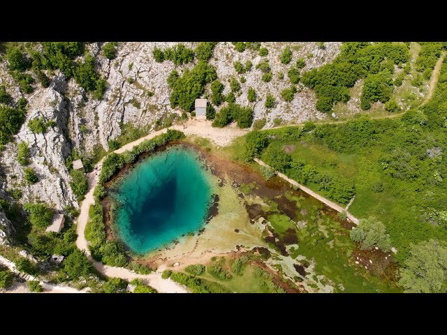 The eye of the Earth - River Cetina Spring and Church of Holy Salvation (9th century) AERIAL