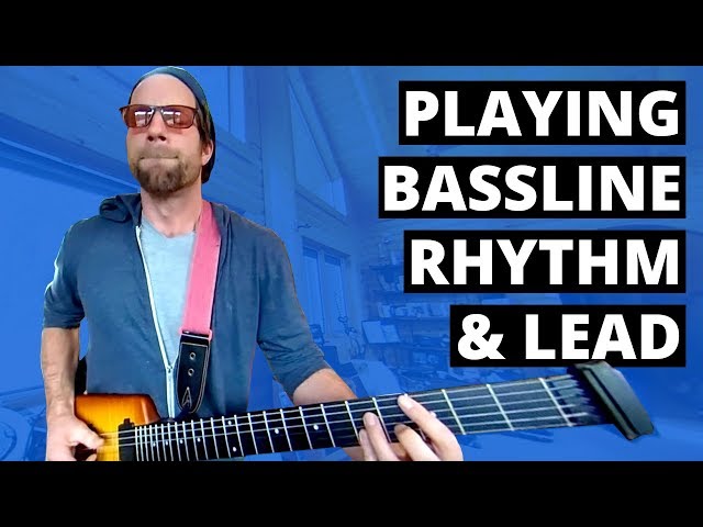 Playing bassline and rhythm and lead on strange baritone guitar