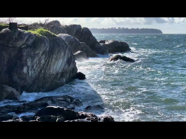 Waves crashing on rocks