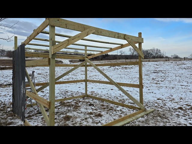 Working on the Pole Barn for our cows!