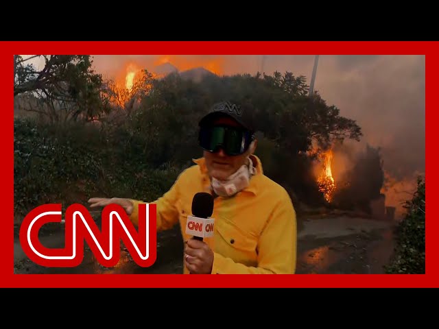 ‘Out of control’: CNN reporter on scene describes Los Angeles wildfire conditions