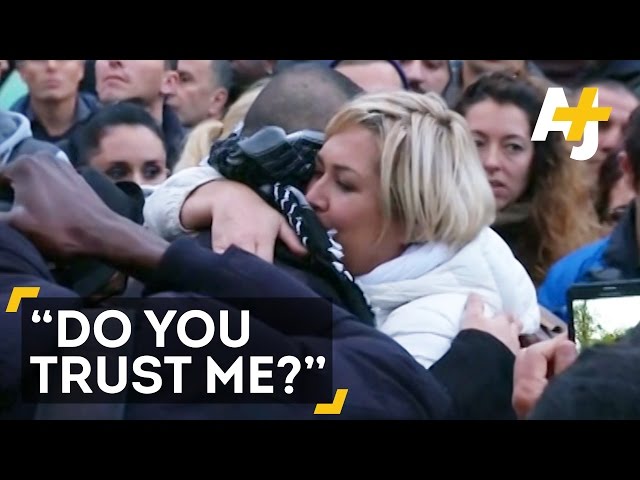 Blindfolded Muslim Man Offers Free Hugs In Paris