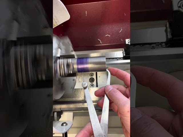 Scribing a length line on a lathe