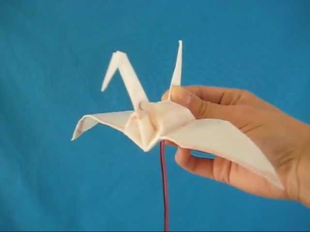 Electronic flapping origami crane