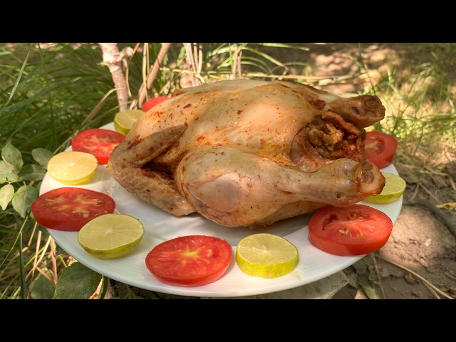 A whole chicken is cooked under a layer of soil🔥Whole stuffed Chicken Recipe Cooking in village