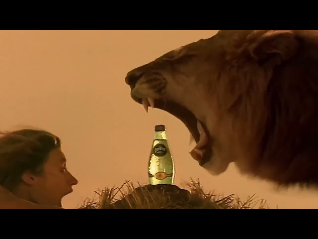 Publicité Perrier avec le face à face Femme vs Lion - "La lionne" de Perrier - I put a spell on you