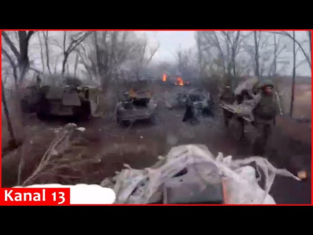 Russians carry their dead and wounded - Video of many Russian vehicles shot down on the side of road