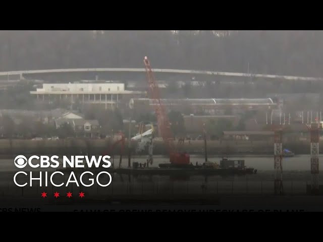 Salvage crews remove wreckage of plane and helicopter from Potomac River