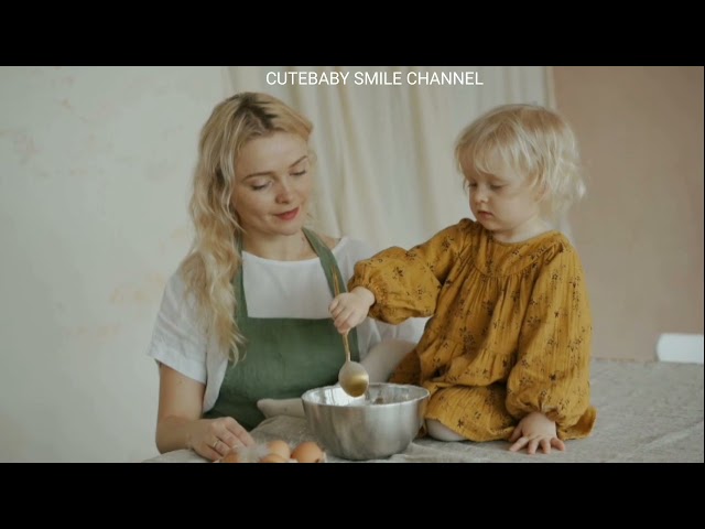 CUTEBABY GIRL MAKING CAKE WITH MOM