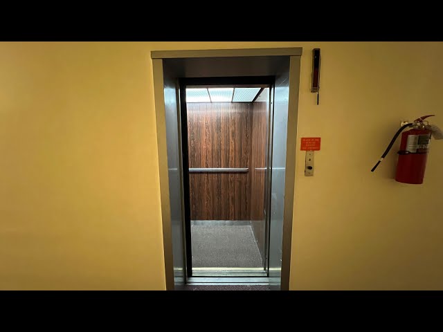 Pittsburgh, PA: Otis Black Button Hydraulic Elevator in an Apartment Building