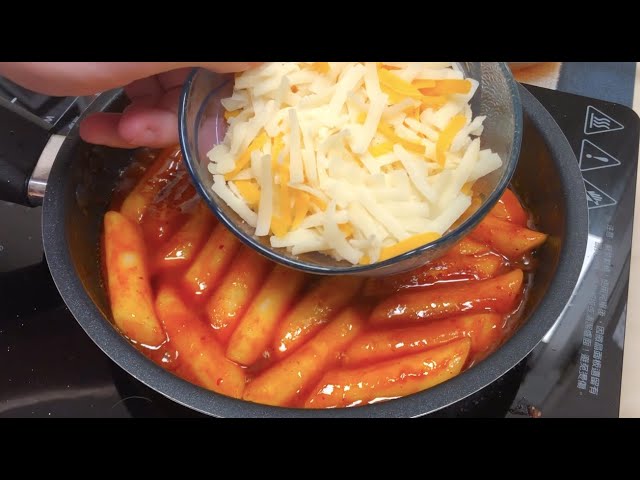 Bacon and cheese Korean TTEOKBOKKI are the best. Korean Street Food Rice Cake.