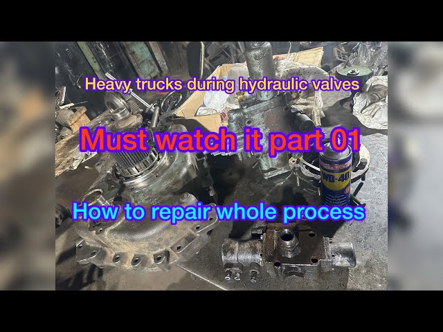 Dump trucks bin lifting hydraulic valves repairing work