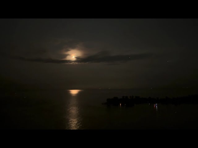 Moon Reflects over Water with music